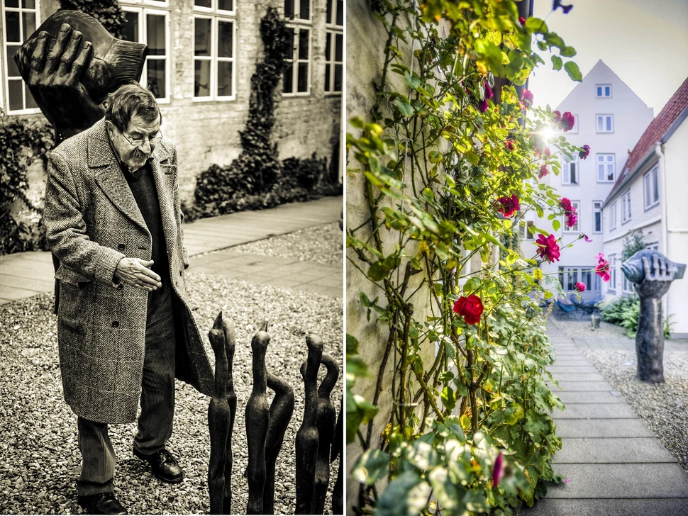 Günter Grass neben seiner Skulptur 7 Vögel